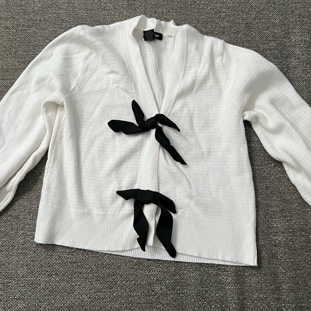White Cardigan with Black Bow Accents
